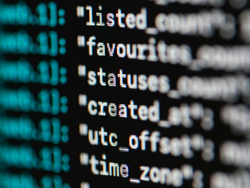 Extreme close-up of computer code displaying various programming terms and elements.